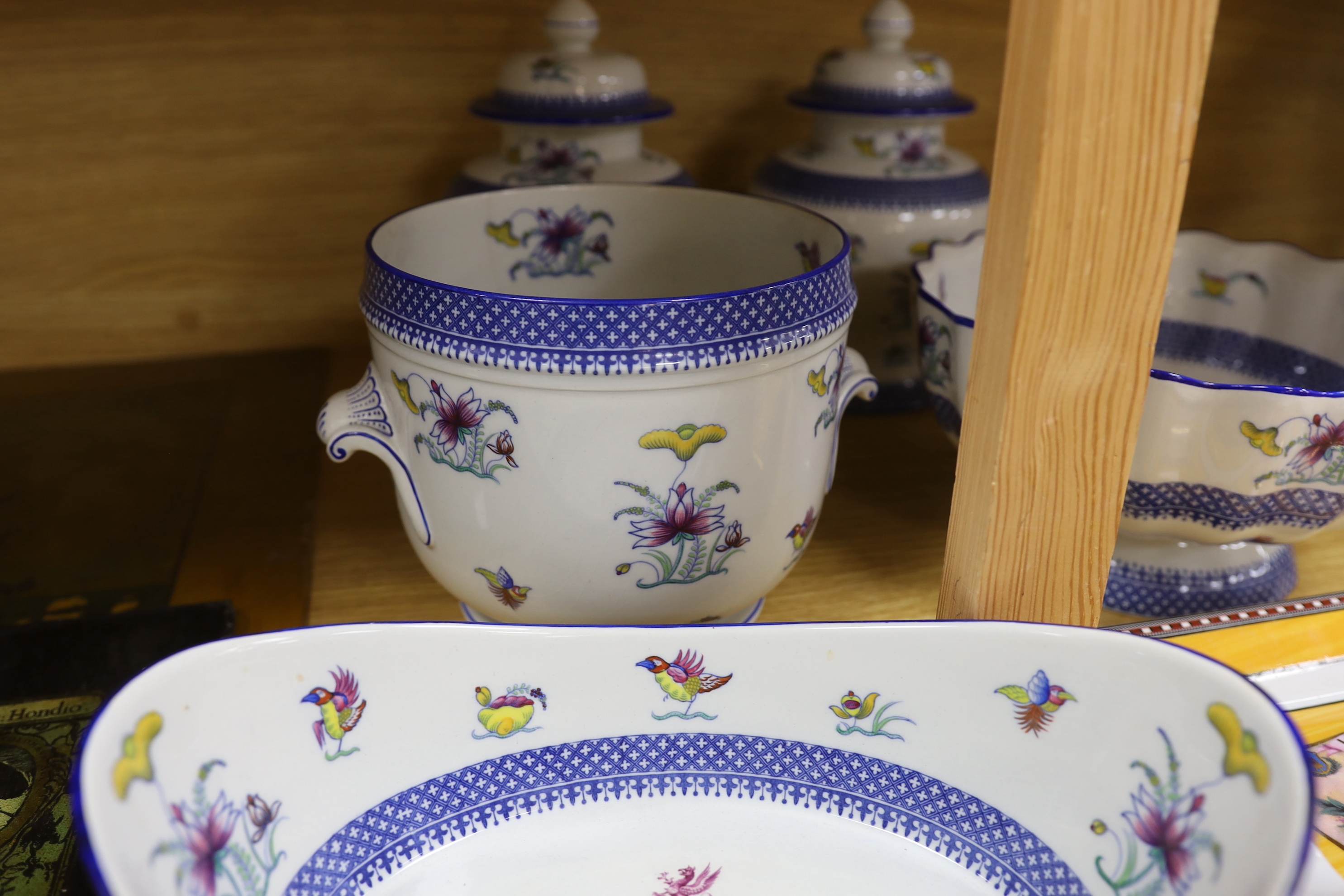 Two Copeland Spode Armorial bowls, a pair of lidded jars a planter and three Limoges ashtrays, jars and covers 24cm high